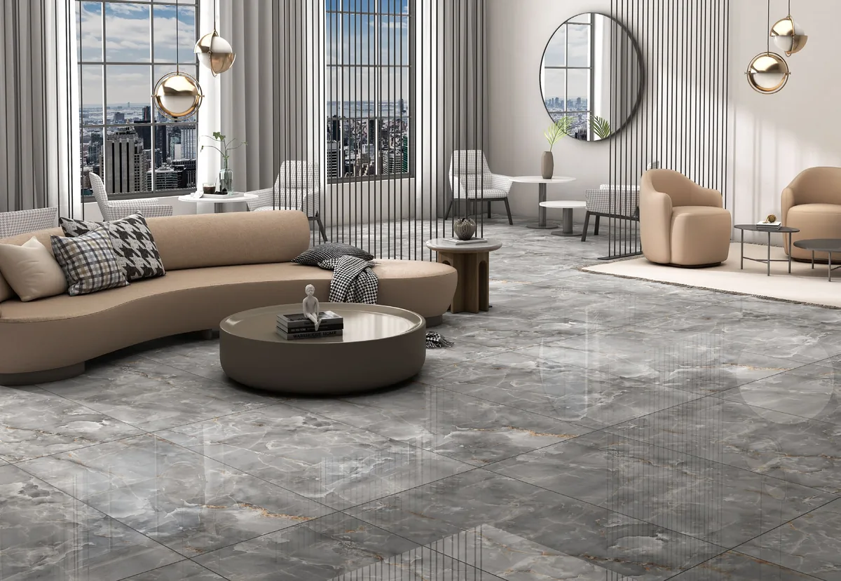 Sala de tonos neutros con piso gris veteado y grandes ventanales.